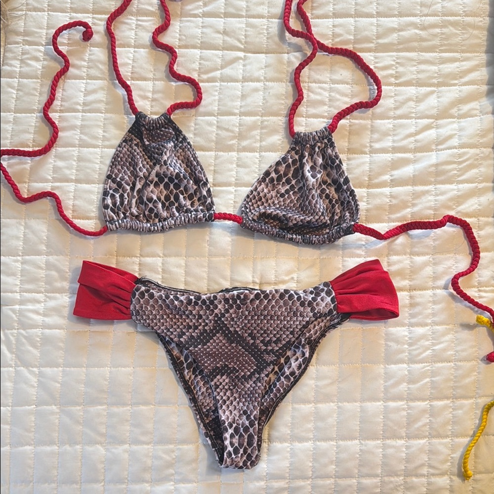 Chic Snakeskin Bikini with Bold Red Accents